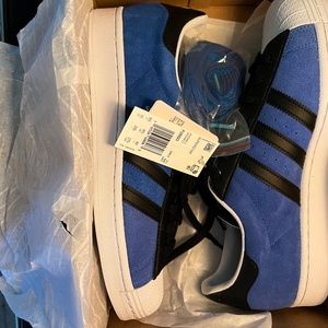 Blue and Black Adidas
